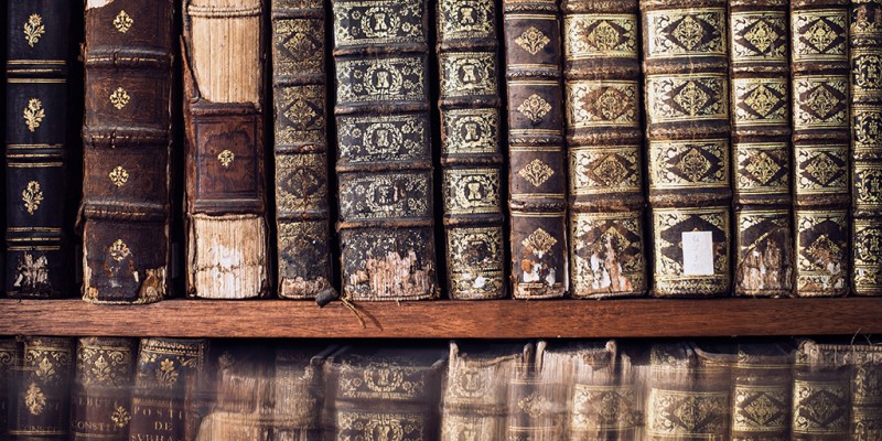 Antique books on a shelf by Samantha Hurley via Burst.