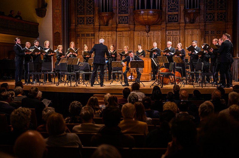 Tafelmusik Chamber Choir and cellist Keiran Campbell on stage of Jeanne Lamon Hall. Photo by Dahlia Katz
