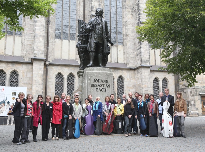 The Orchestra posing with the statue of Johann Sebastian Bach at St. Thomas Church, Leipzig, 2014.