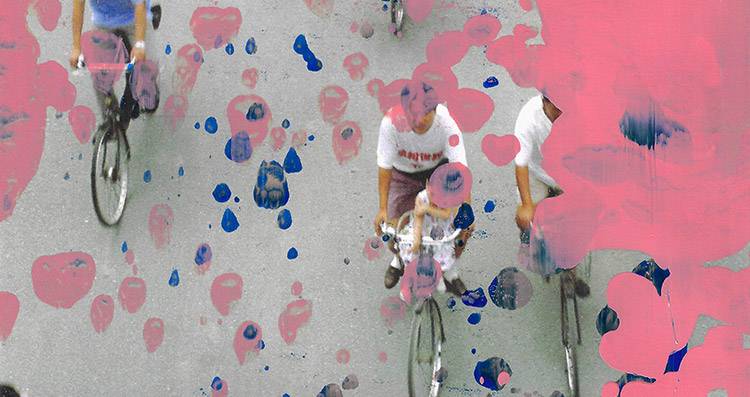 An aerial photograph of people riding bicycles with colourful paint splatters over the image..