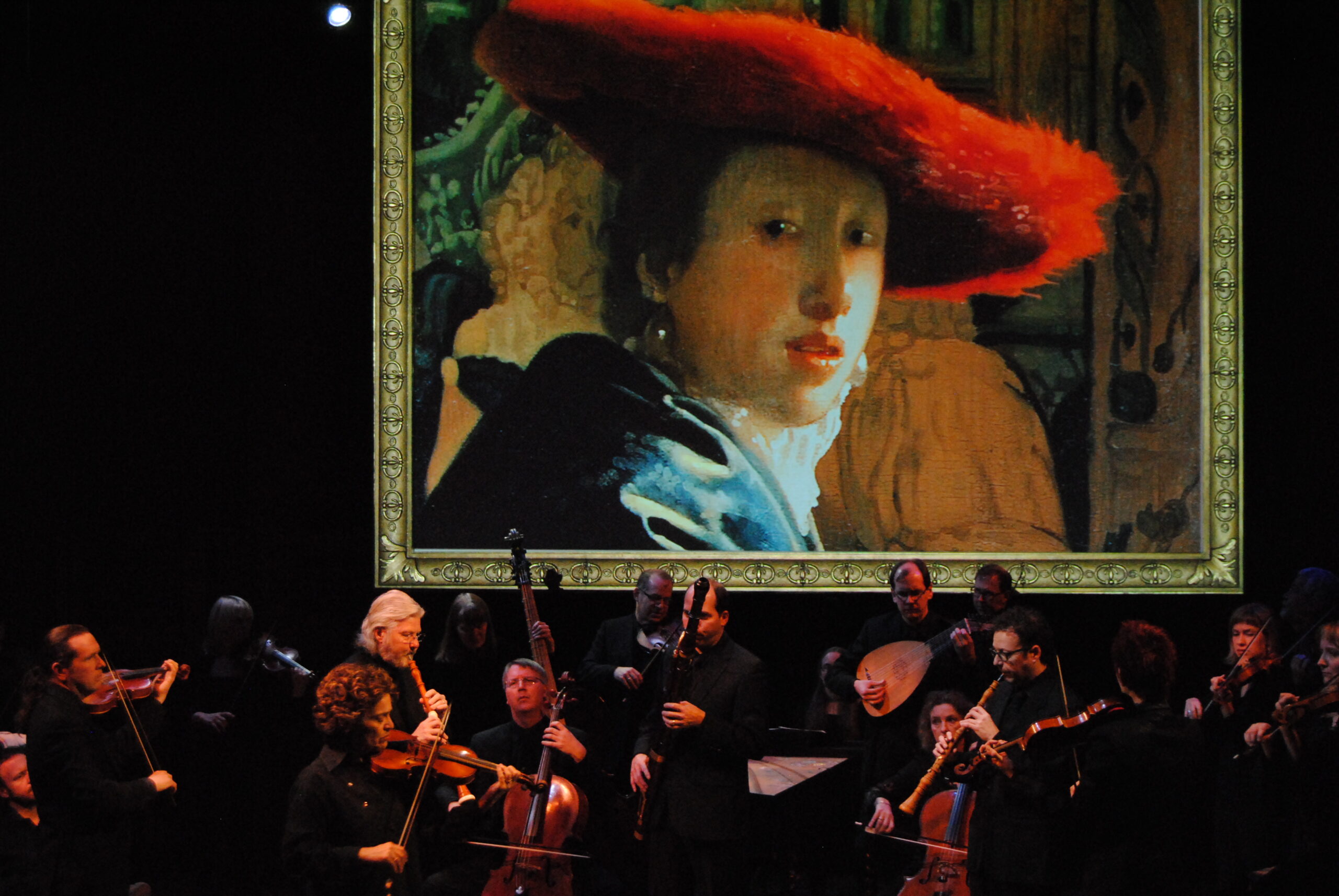 Tafelmusik with Vermeer, Girl with a red hat