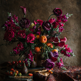 A beautiful bouquet of flowers with a raspberry tint on them 